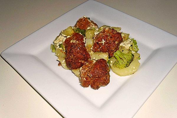 Meatballs on Potato Broccoli