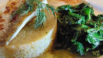 Pikeperch in Sesame Herb Crust on Spinach Leaves