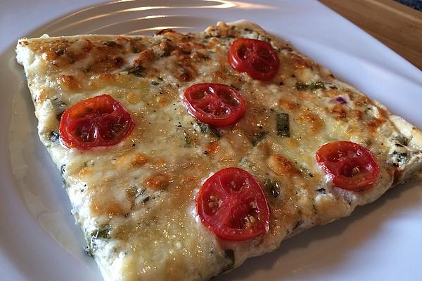 Pizza with Mozzarella, Sage, Wild Garlic and Tomatoes