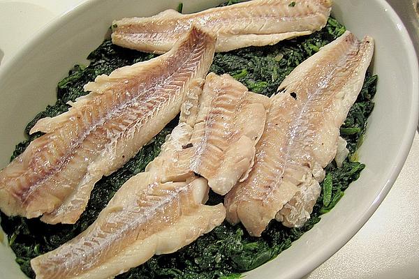 Pollack Fillet on Spinach Leaves
