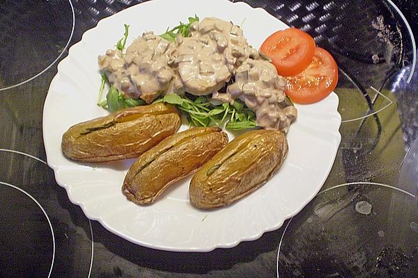Pork Medallions on Rocket with Garlic – Rosemary – Potatoes