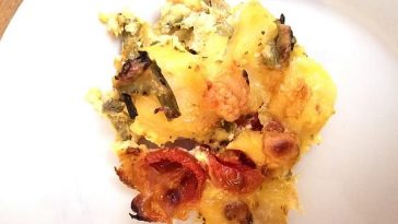 Potato Gratin with Tomatoes and Herder Cheese