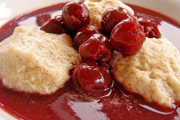 Quark Dumplings on Strawberry Purée