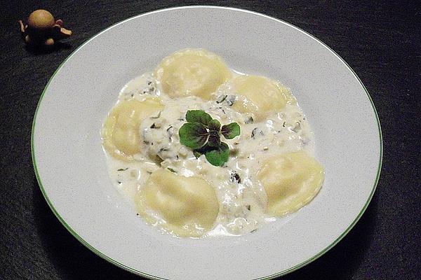 Ravioli with Salmon Filling with Lemon and Basil Sauce