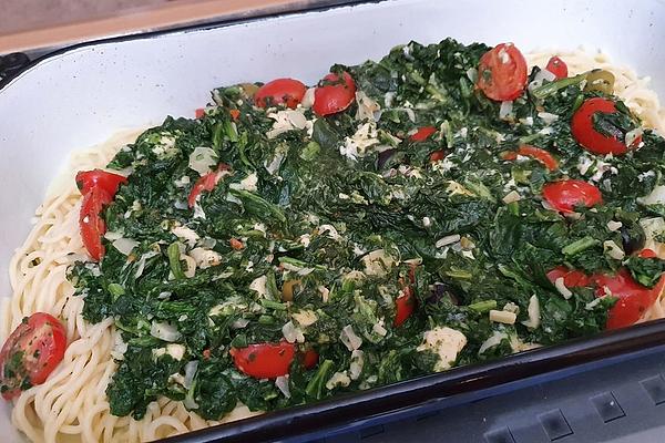 Spaghetti with Creamy Spinach Cheese Sauce and Roasted Pine Nuts