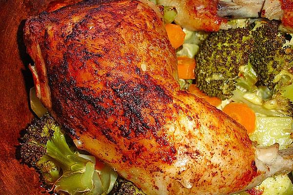 Spicy Chicken Legs on Vegetables in Römertopf