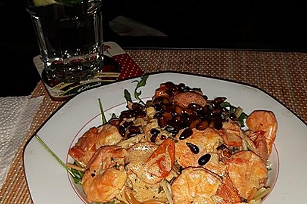 Tagliatelle Aglio E Olio with Cherry Tomatoes and Shrimp on Bed Of Rocket