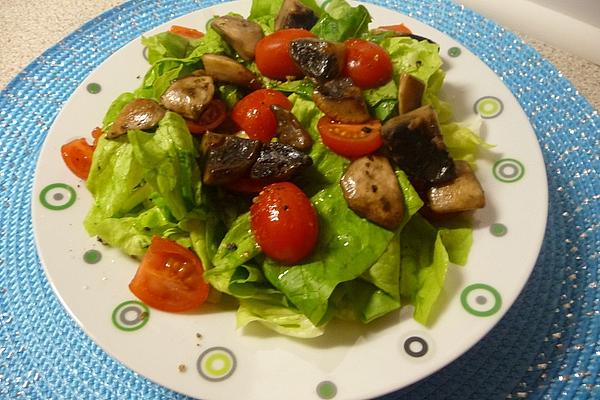 Tomatoes and Mushrooms on Iceberg Lettuce