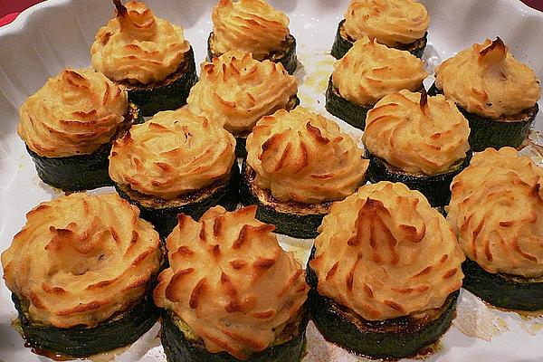 Zucchinitaler with Potato and Shallot Topping