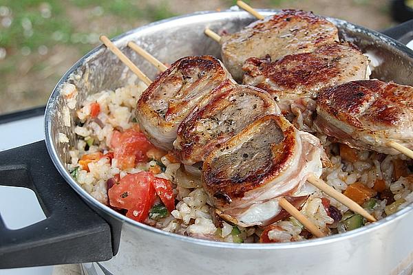 Pork Loin Wrapped in Bacon on Vegetable Risotto