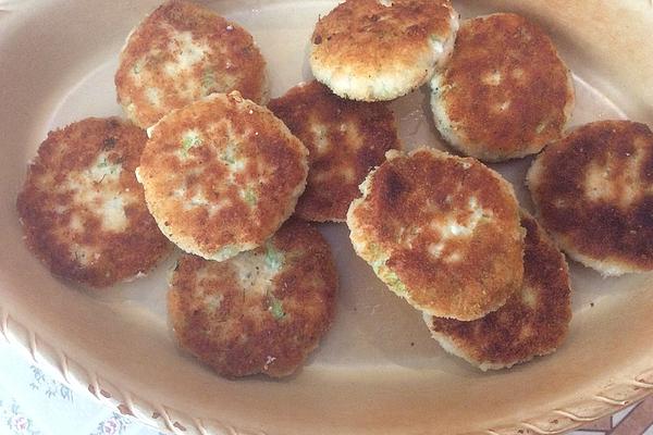 Salmon Cakes Made from Salmon Fillet and Smoked Salmon with Cucumber Salad